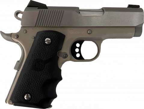 Colt Defender 9mm facing right